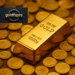 Close-up of shining gold bars stacked together, symbolizing gold price forecast and XAU/USD market trends